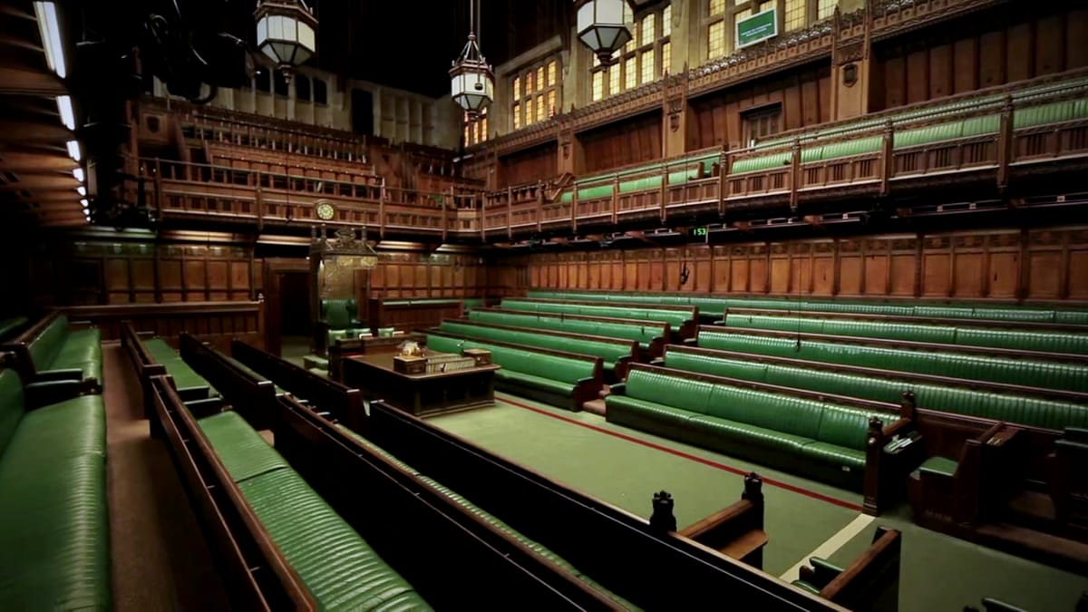 The House of Commons chamber, showing the green benches where elected MPs debate and vote on legislation
